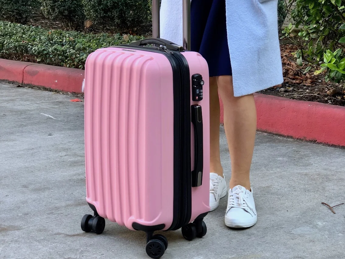 calpak carry on pink